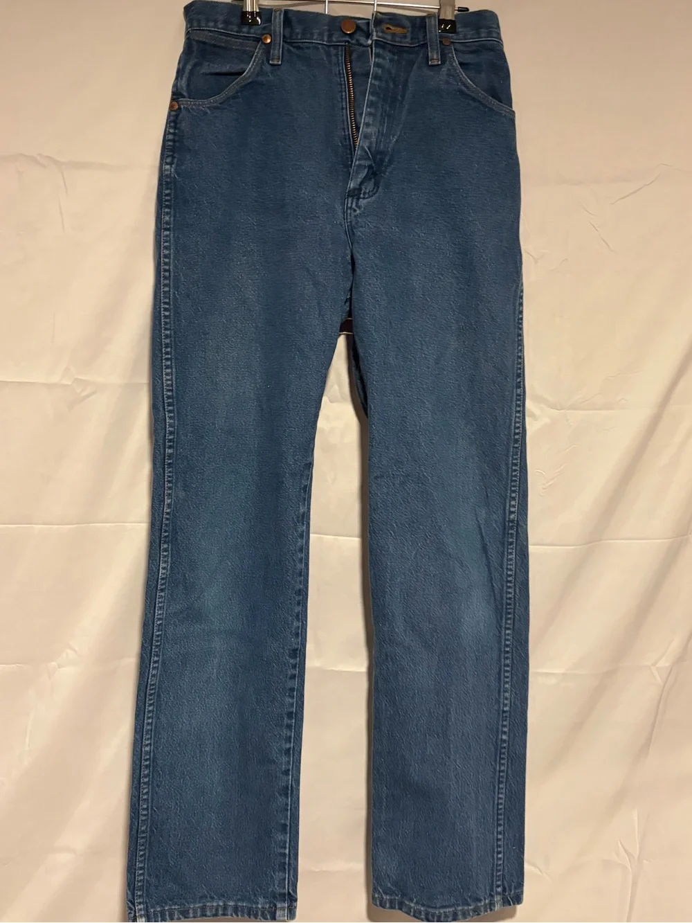 Wrangler Relaxed Fit Denim Jeans in Medium Blue with Orange Stitching
